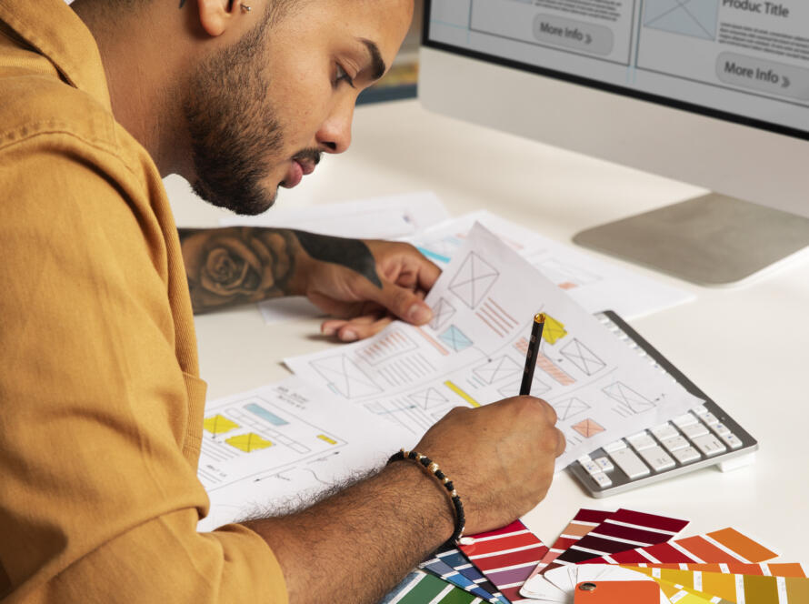 man designing websites side view